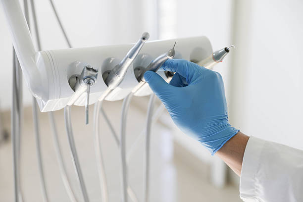 Professional Tooth Extraction technician working in Abram, TX